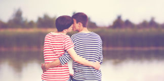 Gay couple kissing