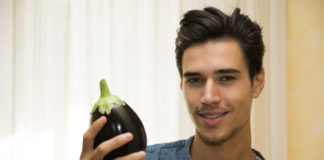 Man holding eggplant. Too big?