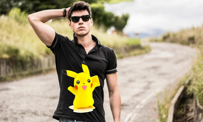 Man outside with Pikachu