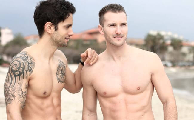 Handsome men on the beach