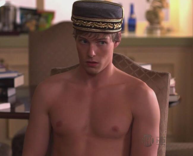Hunter Parrish reading in a hat
