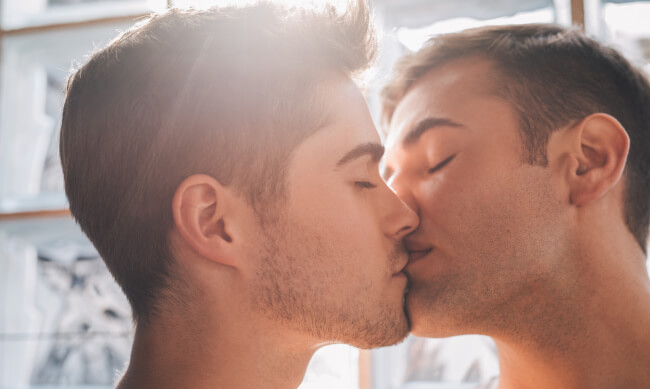 Gay couple kissing