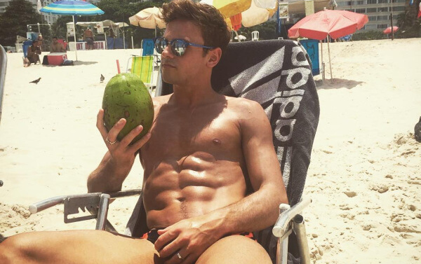 Tom Daley on the beach