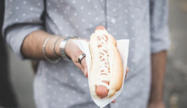 Holding hot dog bun