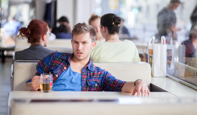 Man in a pub with beer