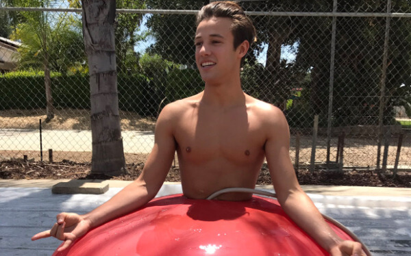 Cameron Dallas Slides With His Friend Chris Into A Giant Condom