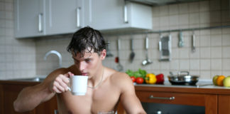 Man drinking tasting breakfast