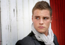 “A Hookup Played Me So Bad On Grindr” Man standing at the door