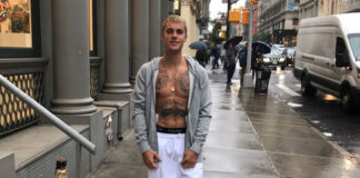 Justin Bieber shirtless in the rain