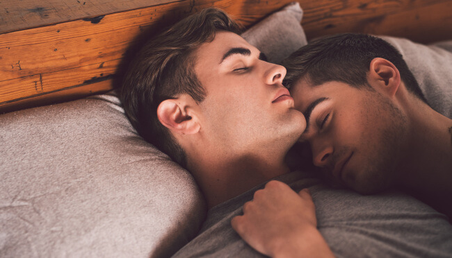 Gay couple in bed