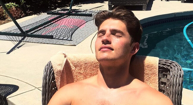 Gregg Sulkin shirtless by the pool