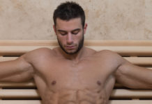 Muscular man in sauna