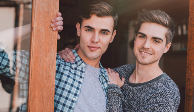 Gay couple standing